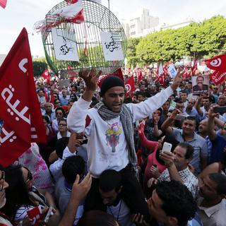 Les manifestations se succèdent en Tunisie. [EPA/Keystone - Mohamed Messara]