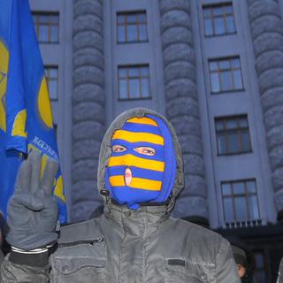 Les jeunes sont déçus par la décision des autorités ukrainiennes de ne pas signer un accord avec l'UE. [AP Photo/Sergei Grits]