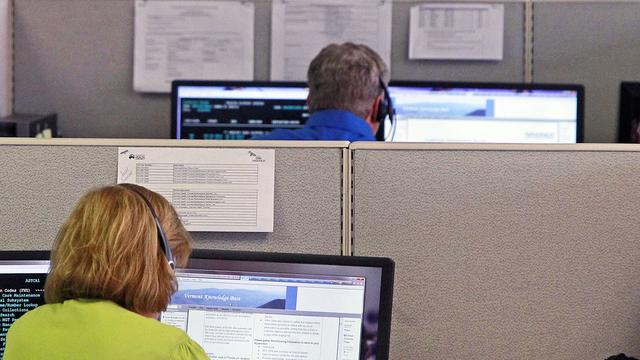 Le conseil d’Etat tessinois veut mettre fin au dumping salarial pratiqué par les call-centers. [AP Photo/Toby Talbot]