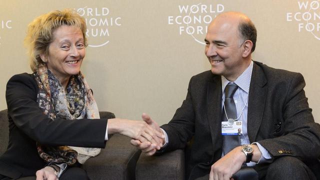 Eveline Widmer-Schlumpf et Pierre Moscovici. [Laurent Gillieron]