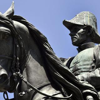 Retour sur la vie du Général Dufour (ici sa statue sur la Place Neuve à Genève). [Keystone - Martial Trezzini]