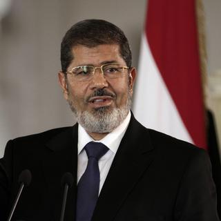Mohamed Morsi a tenu un discours sur la télévision d'Etat mardi soir. [AP Photo/Maya Alleruzzo]