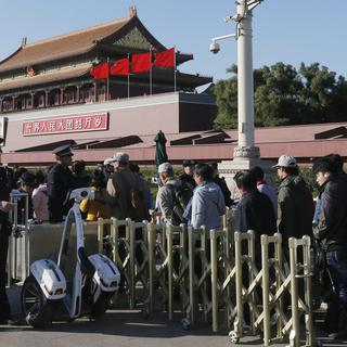 La police sur le qui-vive après l'accident de la place Tiananmen à Pékin. [EPA/ROLEX DELA PENA]
