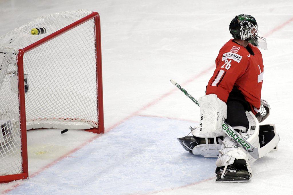 Martin Gerber, qui a détourné 13 des 14 tirs adverses, a été élu homme du match dans le camp suisse. [KEYSTONE - Salvatore di Nolfi]