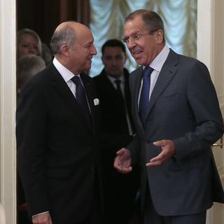 Le ministre français Laurent Fabius en compagnie de son homologue russe Sergei Lavrov. [EPA/Keystone - Maxim Shipenkov]
