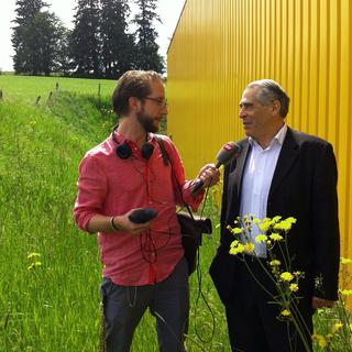 Thomas Gutersohn avec Marc Bloch des cafés La Semeuse à La Chaux-de-Fonds. [Rouven Gueissaz]