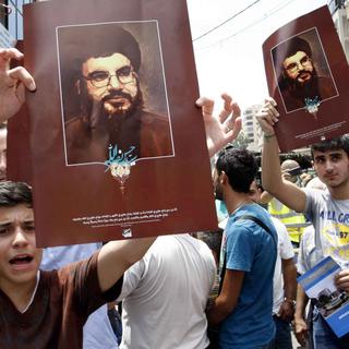 Les Libanais sont divisés entre pro et anti-Hezbollah. [Anadolu Agency/AFP - Bilal Jawich]