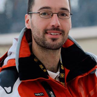 Sylvain Freiholz, consultant de RTSsport pour le saut à ski. [Eddy Risch]