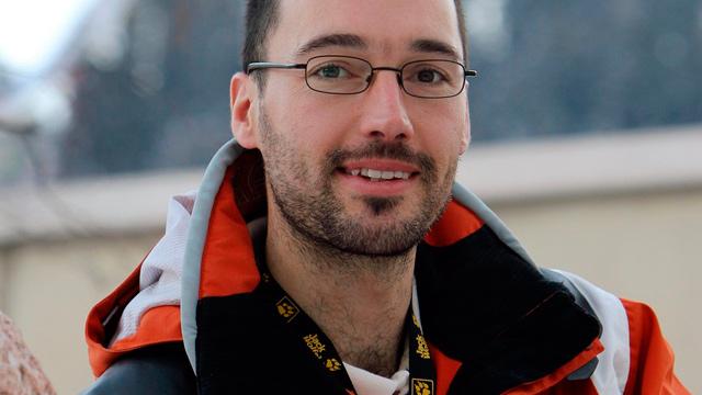 Sylvain Freiholz, consultant de RTSsport pour le saut à ski. [Eddy Risch]