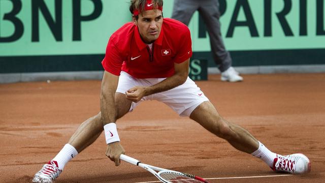 Roger Federer avait porté les couleurs de la Suisse lors de la Coupe Davis, le 14 septembre 2012. [EPA - TOUSSAINT KLUITERS]