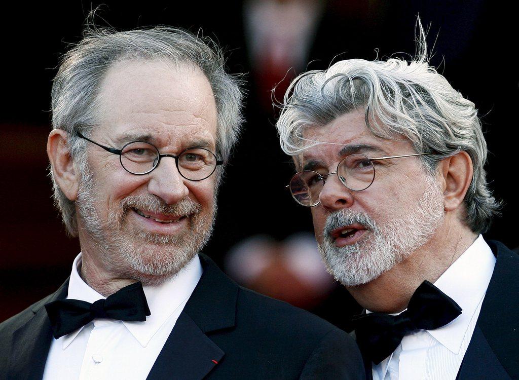 Les réalisateurs Steven Spielberg et George Lucas à Cannes en 2008. [KEYSTONE - GUILLAUME HORCAJUELO]