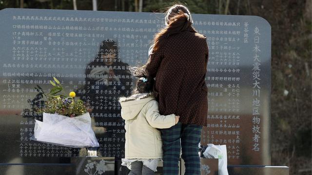 A l'heure du séisme qui a frappé le Japon, 14h46 locales (05h46 GMT), une minute de silence a été observée à travers tout le pays. [KIMIMASA MAYAMA]