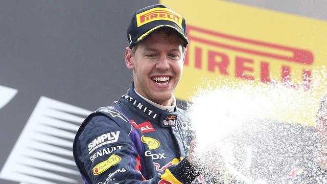 Sebastian Vettel peut sabrer le champagne pour le 32e succès de sa carrière. [AP Antonio Calanni]