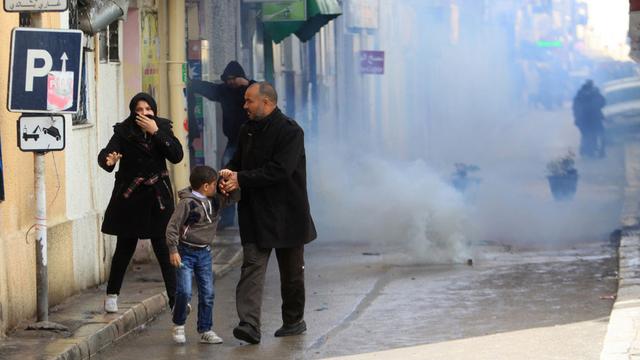 Après les violences de jeudi (ici à Tunis), ce vendredi est à haut risque en Tunisie. [AP/Keystone]