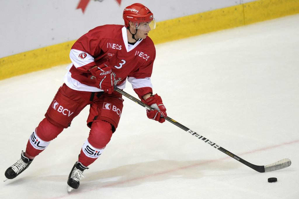 Benjamin Chavaillaz, qui jouera à Ambri la saison prochaine, va "tout donner pour emmener le LHC en LNA". [KEYSTONE - Laurent Gilliéron]