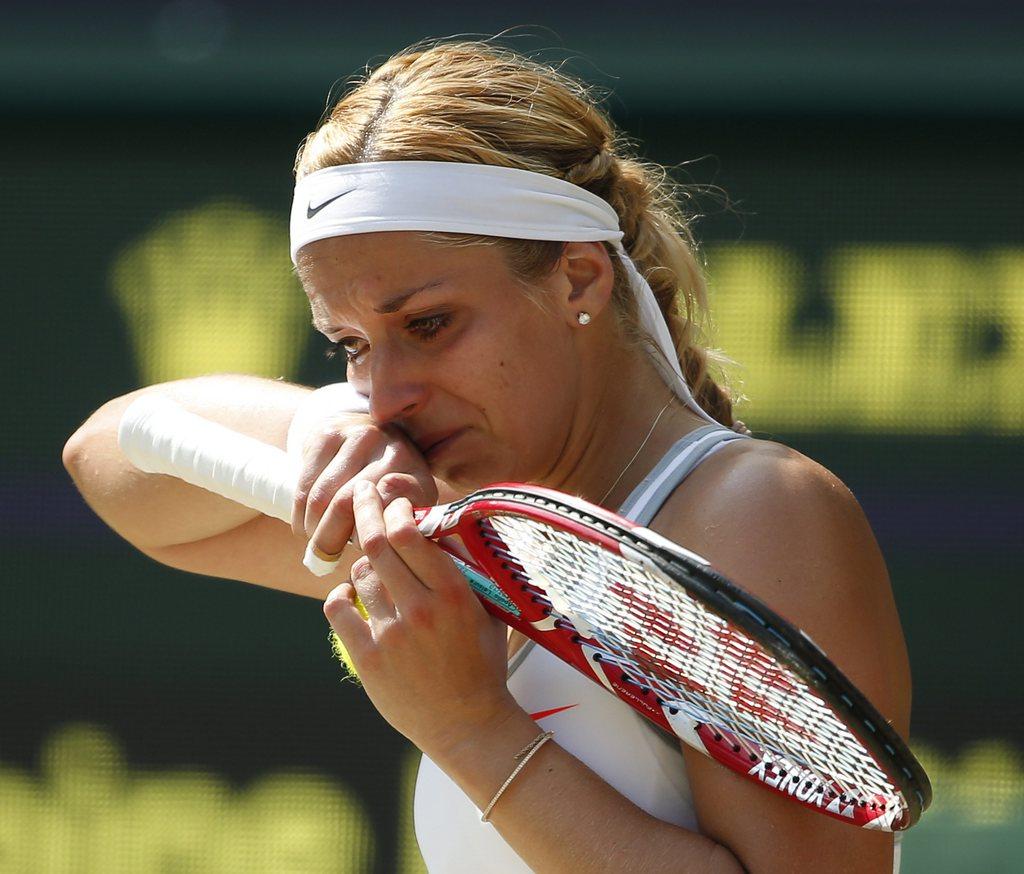 En larmes. Sabine Lisicki a craqué nerveusement en pleine finale. [KERIM OKTEN]