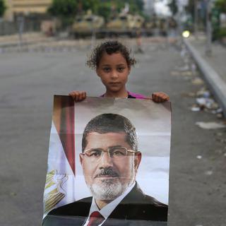 L'ex-président Morsi est détenu au secret par l'armée égyptienne depuis sa destitution le 3 juillet. [Hassan Ammar]