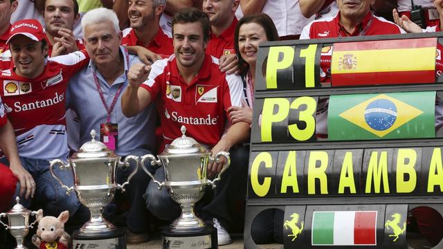 L'écurie Ferrari fête le succès d'Alonso et le podium de Massa. [Luca Bruno]