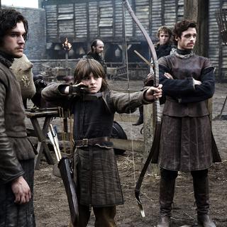 Une image de la première saison de la série "Game of Thrones". Avec Kit Harington, Isaac Hempstead Wright, Richard Madden. [Photo12 / AFP - Helen Sloan]