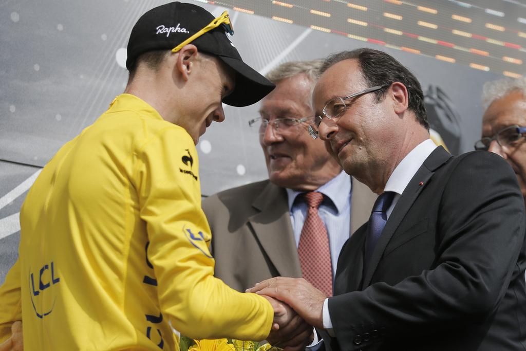 Froome a été félicité pour sa résistance par le président François Hollande. [KEYSTONE - Christophe Ena]