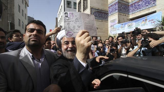 Hassan Rohani a bénéficié du soutien des ex-présidents modérés Hachemi Rafsandjani et Mohammad Khatami. [Hadi Hirbodvash]