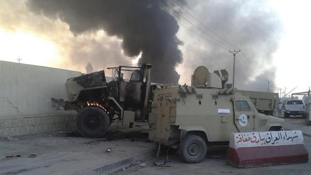 Des véhicules appartenant aux forces de sécurité irakiennes, abandonnés à l'arrivée de l'EIIL dans Mossoul.