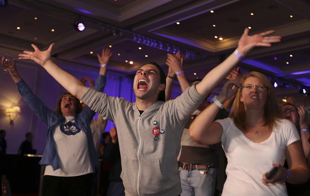 A Glasgow, des supporters du "non" réagissent aux premiers résultats. [AP Photo - Lynne Cameron]