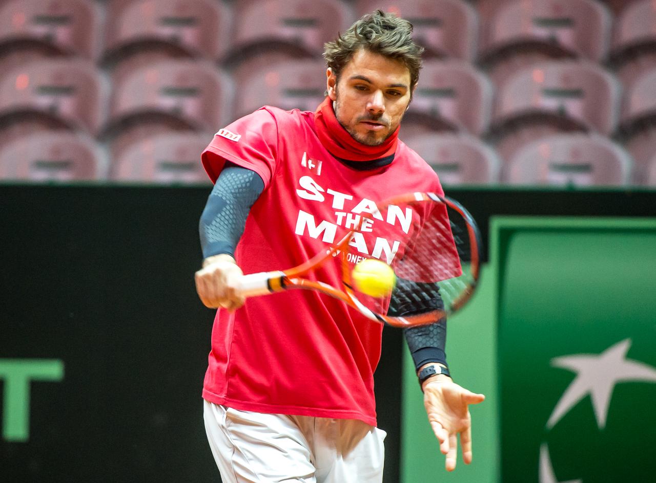 Stan devrait normalement affronter Wawrinka vendredi. [AFP - PHILIPPE HUGUEN]