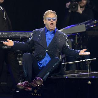 Sir Elton John, jeudi soir sur la scène de Paléo. [EPA/Keystone - Martial Trezzini]