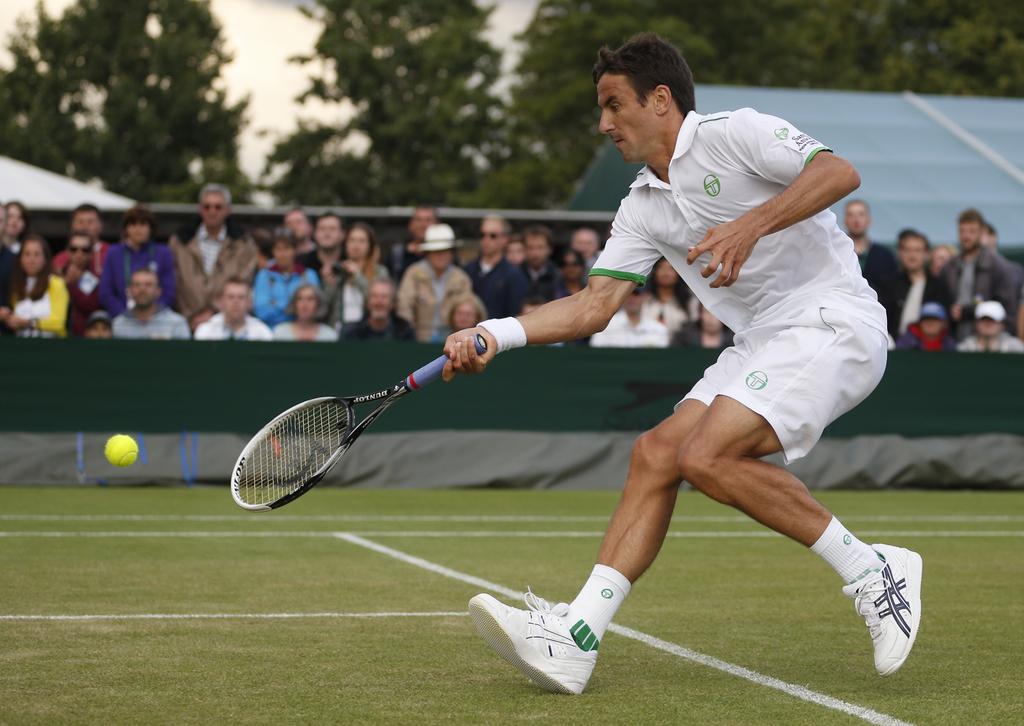 En 1-8, Federer retrouvera Tommy Robredo, qui l'avait battu à l'US Open 2013. [KEYSTONE - Pavel Golovkin]