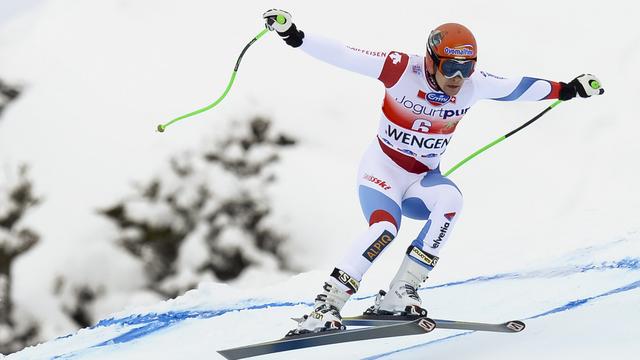 Patrick Küng dans ses oeuvres sur la piste du Lauberhorn. [Jean-Christophe Bott]