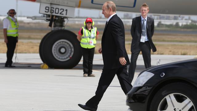 Vladimir Poutine, sur le tarmac de Brisbane, en Australie, peu avant son départ vers la Russie. [Rob Maccoll]