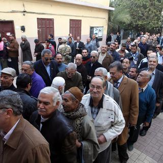 Les Egyptiens se sont déplacés nombreux pour voter sur une éventuelle nouvelle constitution. [EPA/Keystone - Khaled Elfiqi]