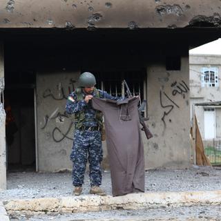 Des combattants kurdes affirment avoir mis fin au siège du mont Sinjar. [AP Photo/Zana Ahmed]