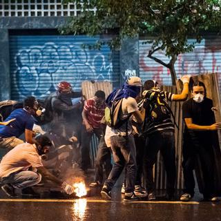 Des manifestants, le 3 avril dernier à Caracas. [Miguel Gutierrez - EPA]