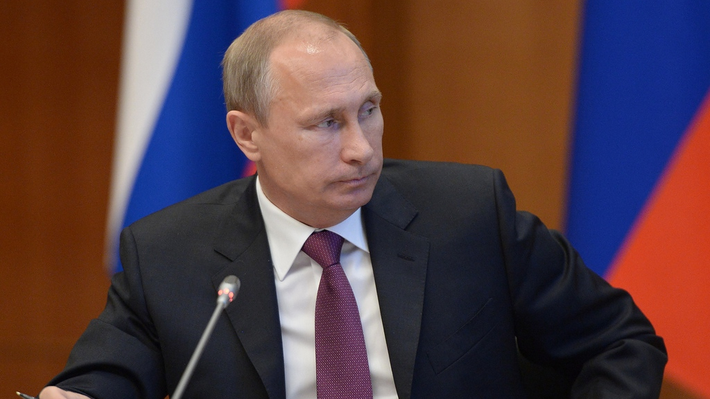 Le Kremlin considère que les propos de Vladimir Poutine sur la possibilité de prendre Kiev ont été sortis de leur contexte. [RIA Novosti/AP/Keystone - Alexei Nikolsky]