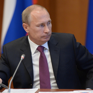 Le Kremlin considère que les propos de Vladimir Poutine sur la possibilité de prendre Kiev ont été sortis de leur contexte. [RIA Novosti/AP/Keystone - Alexei Nikolsky]