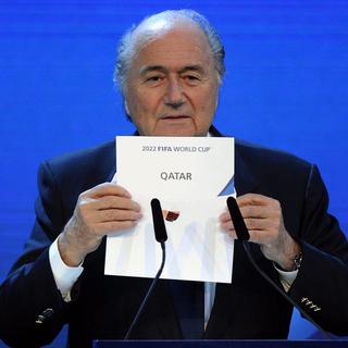 Sepp Blatter annonce l'attribution de la Coupe du monde au Qatar. [Walter Bieri, File]