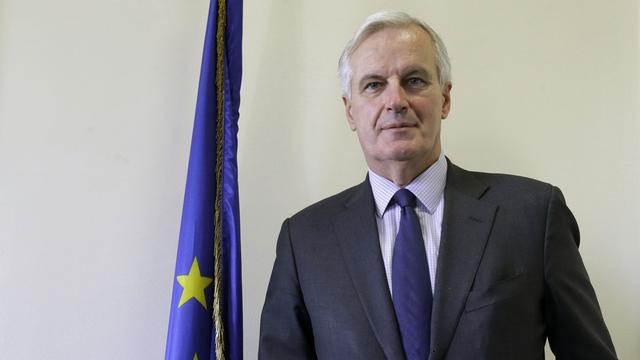 Le commissaire européen aux Services financiers Michel Barnier a salué "une avancée décisive". [Jacky Naegelen]