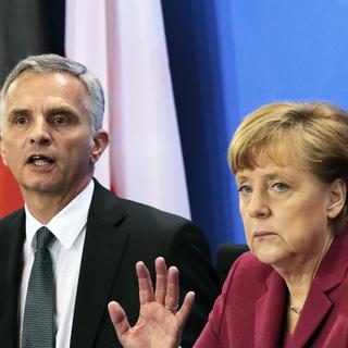 Didier Burkhalter et Angela Merkel veulent prendre le temps de discuter. [AP Photo/Markus Schreiber]