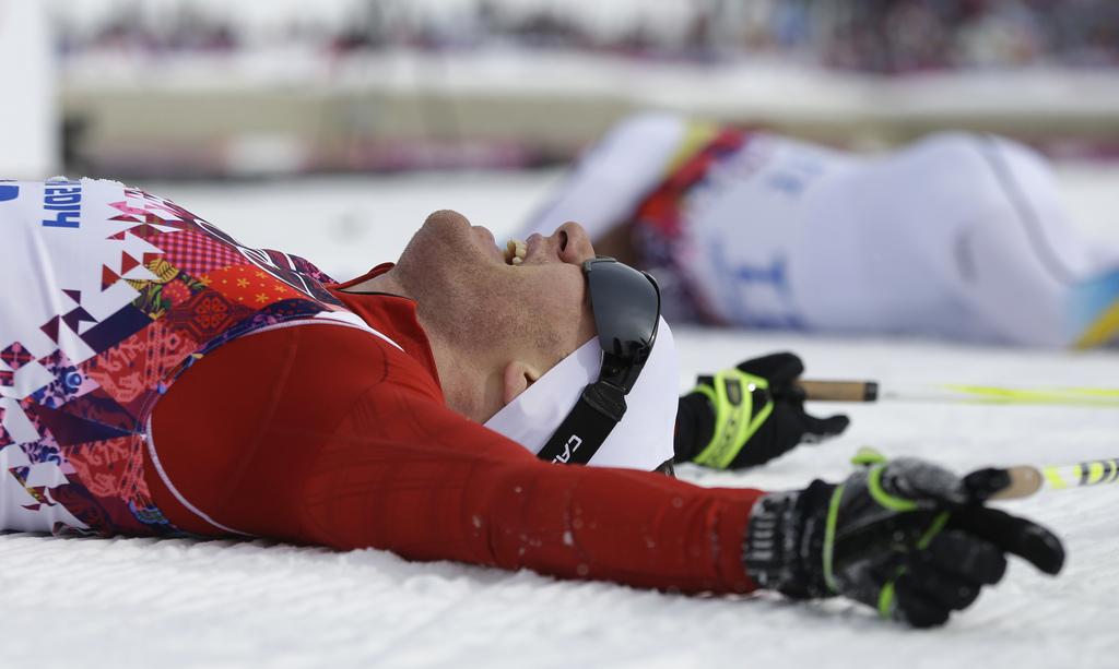 Dario Cologna fête son 2e titre olympique et offre sa 1ère médaille à la Suisse à Sotchi! [Gregorio Borgia]