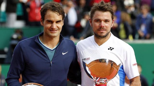 Roger Federer et Stanislas Wawrinka. [EPA/Keystone - Sébastien Nogier]