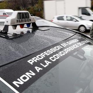 Uberpop sera interdit en France dès le 1er janvier. [EPA/Yoan Valat]