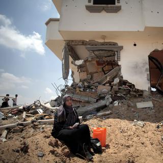 La bande de Gaza a été dévastée par un mois de frappes israéliennes. [AP Photo/Khalil Hamra]