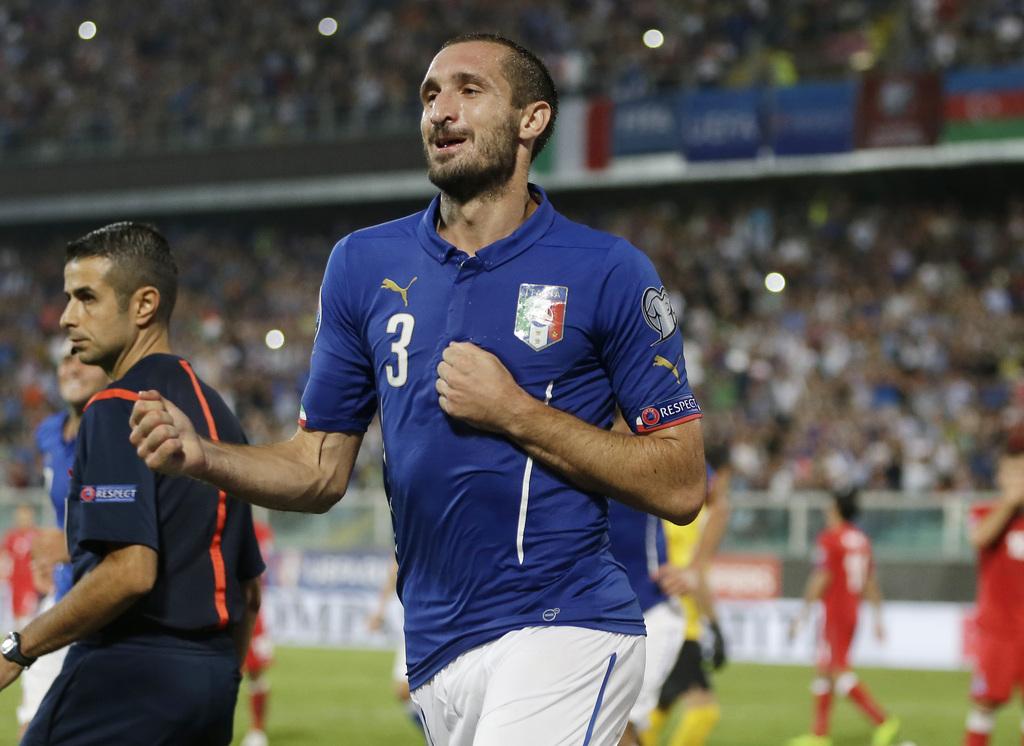 Avec trois buts, dont un contre son camp, Chiellini a été l'homme de la soirée. [KEYSTONE - ANTONIO CALANNI]