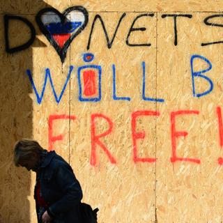 Un grafitti "Donetsk sera libre" à Donetsk. [John Macdougall]