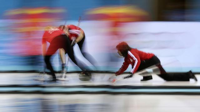 Le curling est sorti de l'ombre depuis qu'il a intégré les disciplines olympiques en 1998. [AP/Keystone - Wong Maye-E]