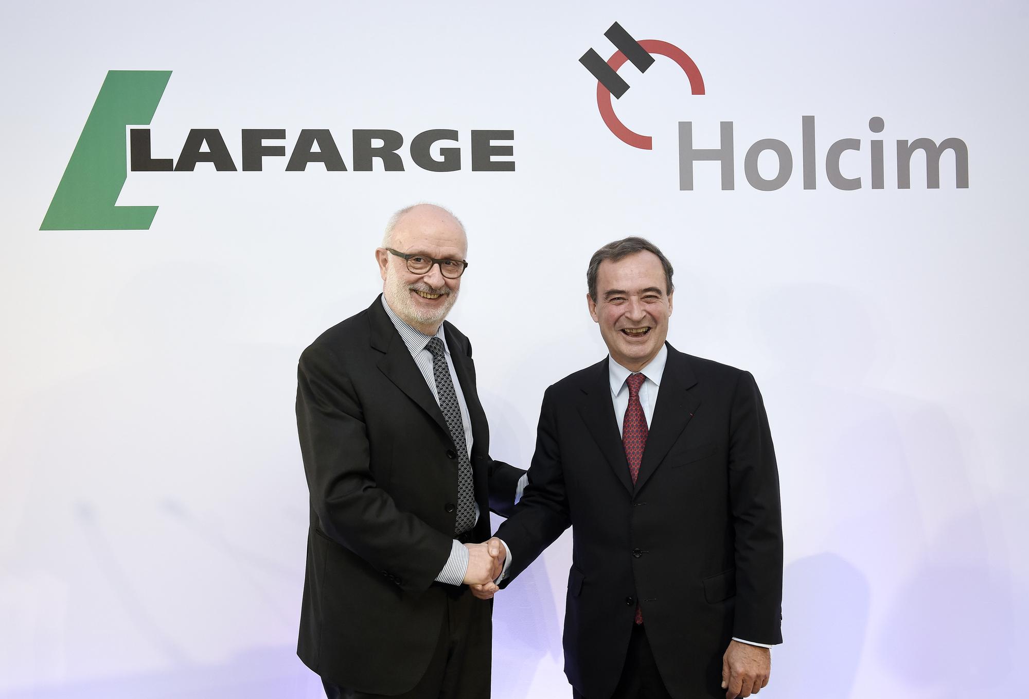 Rolf Soiron, président du conseil d'administration de Holcim, et Bruno Lafont, directeur général de Lafarge.