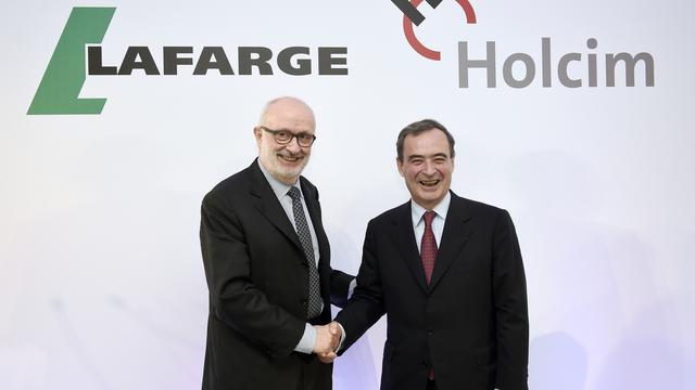 Rolf Soiron, président du conseil d'administration de Holcim, et Bruno Lafont, directeur général de Lafarge.