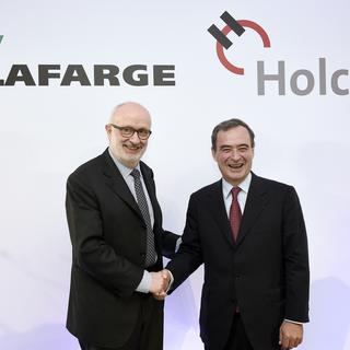 Rolf Soiron, président du conseil d'administration de Holcim, et Bruno Lafont, directeur général de Lafarge.